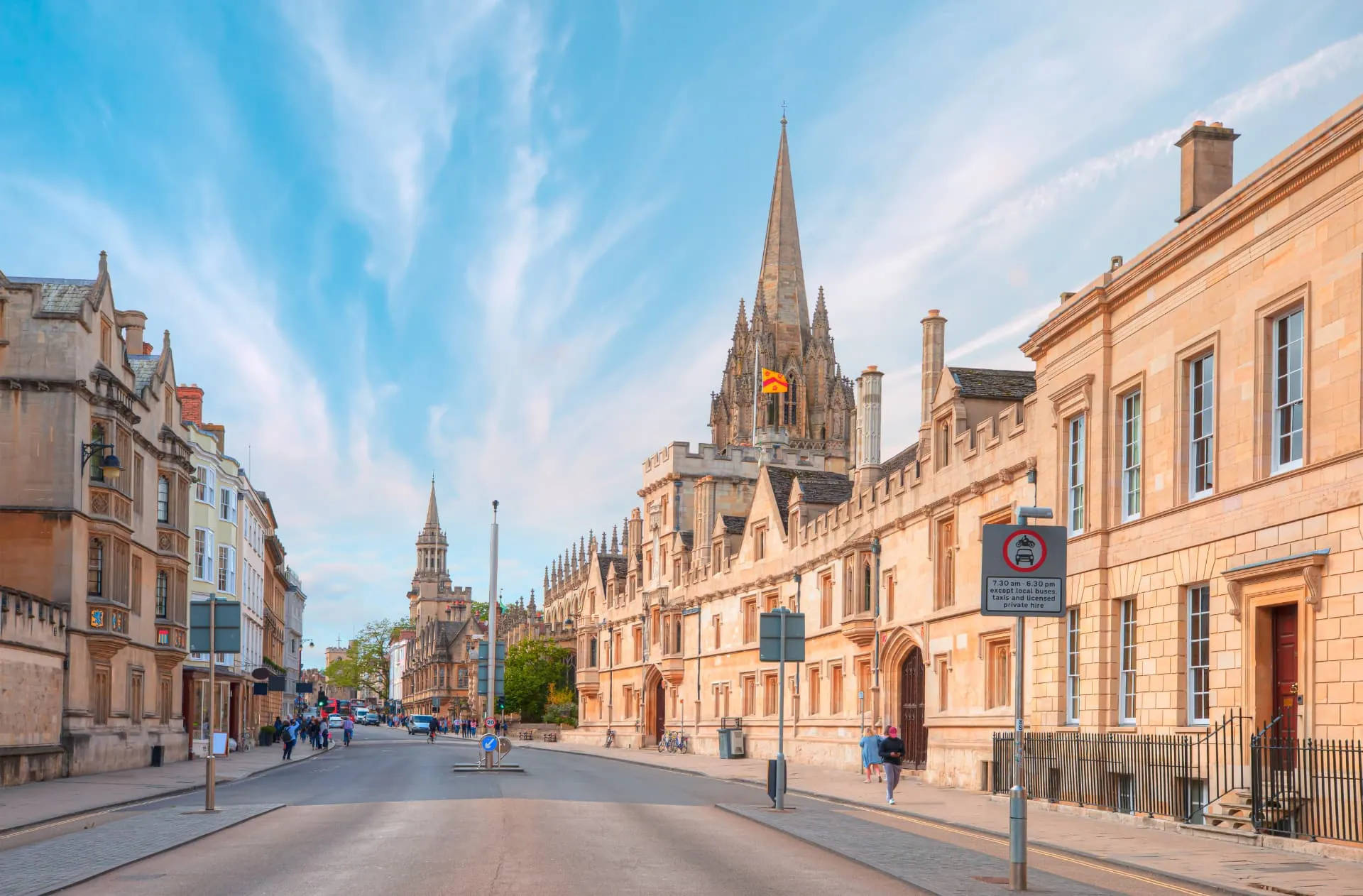 Central Oxford streetscape with historic university buildings and church spire